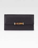 Continental wallet with bamboo detail in leather with light goldtone hardware.Snap closure Twelve card slots Two bill compartments Two separate interior compartments Zip coin pocket Fully lined 7½W X 4¼H X ½D Made in Italy