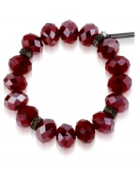 Paint the town red with this stretch bracelet from Kenneth Cole New York. Crafted from hematite-tone mixed metal, the bracelet features red faceted beads and pave glass crystal accents for visual appeal. Approximate length: 7-1/2 inches.