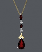 A drop of elegance to heighten your look. Bold garnet gemstones (1-3/4 ct. t.w.) in pear and marquise shapes combine with sparkling diamond accents in a sterling silver and 14k gold setting. Approximate length: 18 inches. Approximate drop: 1-1/3 inches.