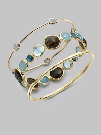 From the Rock Candy® Collection. Five, pretty, milky aquamarine cabochon stations on a delicate 18k gold bangle. Milky aquamarine18K goldDiameter, about 2½Slip-on styleImported Please note: Bracelets sold separately. 