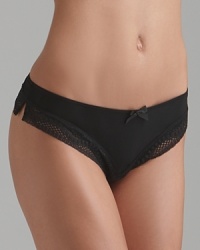 A silky soft thong with ornate lace detail along legs.