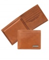 Crafted in smooth, handsome leather, this passcase wallet from Geoffrey Beene is a must-have for guys of all ages.