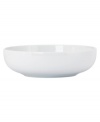 Clean up your table with the minimalist shapes and pure white glaze of Dansk's Arabesque White dinnerware. Dishes like this pasta bowl combine unparalleled versatility and less-is-more style with durability for daily use. (Clearance)