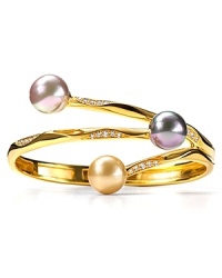 A chic bangle with three overlapping pearls on bands of 18 Kt. vermeil gold with pave stone accents. Designed by Majorica.