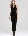 Sleek and streamlined, Halston Heritage's halter jumpsuit lends a flawless look in classic black.