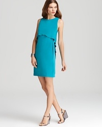 A softly ruffled overlay lends a feminine finish to this sleek Tibi dress in statement-hued silk.