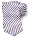 Michael Kors gets down to business with a luxuriously soft silk tie, featuring a simple gingham pattern for a breath of fresh air.