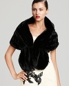 In plush faux fur, a luxe Sue Wong wrap lends a glamorous layer to chilly evenings.