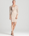 Sue Wong's lace dress lends a classic look in a timeless hue and double v-neck silhouette.