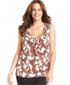 Look pretty in paisley with Charter Club's sleeveless plus size top, accented by a ruffled front.