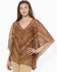 Embodying the rustic elegance of the Southwest in a serape-striped print, this airy georgette top speaks volumes in a beautifully draped silhouette.