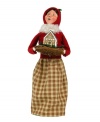 Start every holiday season on a sweet note. This rosy-cheeked woman is bundled tight, caroling door to door and delivering yummy treats with the rest of the Gingerbread Family figurines, all handcrafted by Byers' Choice.