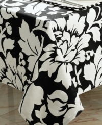 Pair this bold floral placemat with other Black and White table linens to enhance colorful meals at home. (Clearance)