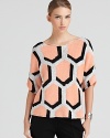 A three-dimensional hexagonal print lends a mesmerizing look to this chicly-knit DIANE von FURSTENBERG sweater.