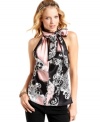 Tie it up with Urban Hearts' cute tie-neck top! The status print is totally on-trend for fall, too.