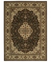 Distinctive flair with roots in Persian design. This exquisitely ornate area rug is abound in deep, sumptuous chocolate tones, highlighted by a dramatic central medallion, and crafted from Nourison's own Opulon™ yarns for a densely woven pile with long-lasting color retention and durability.