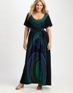 Inspired by the gorgeous peacock feather, this silky maxi dress offers the perfect fit, thanks to its self-tie belt. The alluring neckline and short sleeves are a flattering bonus.ScoopneckShort sleevesSelf-tie beltAllover printAbout 45 from natural waist60% silk/40% polyesterDry cleanMade in USA of imported fabric