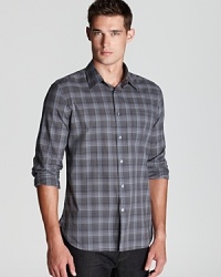 Invite this plaid shirt into your wardrobe of button-downs for a handsome design with traditional, masculine appeal.