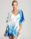 Make a splash with this Trina Turk coverup tunic in bold tie-dye that's water-inspired.