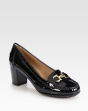 Glassy patent leather in a traditional moccasin design with a logoed buckle and chunky stacked heel. Stacked heel, 2 (50mm)Patent leather upperRubber solePadded insoleMade in Italy