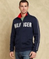 Let this sporty track jacket from Tommy Hilfiger set the pace for your fall style.