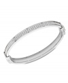 Shimmering and stylish. Fossil's bangle bracelet is crafted from silver-tone stainless steel with sparkling accents providing a lustrous touch. Approximate diameter: 2-5/8 inches.