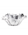 A delicately ruffled flower in pure glass, this figural Leporis bowl from Gibson suffuses your table with a touch of spring. Use for serving the meal or as a simple centerpiece.