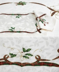 A classic holly and ribbon motif in a durable cotton blend make Lenox Holiday Nouveau placemats a permanent fixture on your Christmas table.