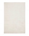 Presenting solid, classic white in soft viscose, the Beckett area rug from Lauren Ralph Lauren offers a chic ground ripe for enhancing any modern setting. Durable enough to withstand heavy indoor traffic, yet luxuriously soft underfoot.