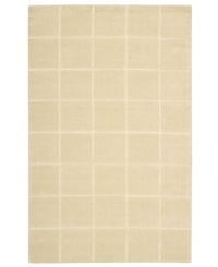 An a-tonal blocked design in luminous ivory creates a sophisticated, modern accent in the Westport area rug from Nourison. Hand-tufted in  India of pure wool for premium softness and durability.