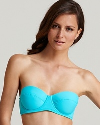 A feminine silhouette flaunts the figure, while a cool blue hue begs for clear Caribbean waters. From Tommy Bahama.