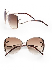 This sleek design boasts a ridged metal frame with hook detailed temples for a truely unique look. Available in shiny rose gold/havana with brown gradient lens. Hook detailed temples100% UV protectionMade in Italy 