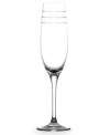 Inspired by the renowned bridal designs of Monique Lhuillier, this fun yet classic stemware collection features a champagne flute with a beautiful etched rim of three beaded lines. The design on this collection of toasting flutes resembles the sparkling traces left over from a shooting star.