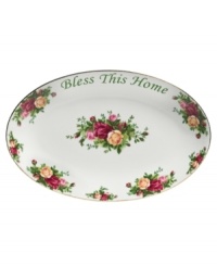 Since 1962, the Old Country Roses collection has graced tables with fresh blooms. From Royal Albert dinnerware, the dishes have sprays of colorful English roses that flourish today, garnishing this elegant oval platter for whatever's on your menu. Bless This Home adds a sentimental touch. With 22-karat gold trim.