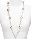 Finish your look with this chic and contemporary two-tone link necklace from Lauren Ralph Lauren.