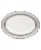 Lavishly detailed with shimmering platinum scrolls and scalloping, the Odessa Platinum bone china oval serving platter is a grand example of formal serveware. Coordinates with a full range of accessories and formal place settings. By Noritake.