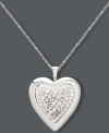 Sparkling romance. This sweet style features a heart-shaped pendant encrusted with round-cut crystals. Set in sterling silver. Approximate length: 18 inches. Approximate drop: 1 inch.