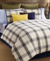 Horizontal and vertical quilting details come together in this European sham from Tommy Hilfiger, featuring white accents on an olive hue for a classic appeal. Tie closure. (Clearance)