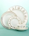 An antique china pattern with stylized sheaves of wheat provided inspiration for our Meadow Silver dinnerware. The plate's generous borders are ringed with flora in subtly formal silver, and-unusually, uniquely-point outward towards the edge. Adorned accent plates have inner rims with slim garland banding, and a curled wheat seedpod for center medallion. Let dressed-up plates become your favored dinner servers.