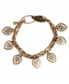 Lucky Brand turns over a stylish new leaf with this charm bracelet. It's crafted from gold-tone mixed metal with plastic accents adding to the appeal. Approximate length: 7-5/8 inches.