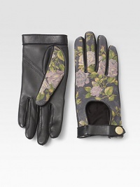 A beautiful floral design completes this biker meets babe design of ultra-soft lambskin leather.Snap-button closureLength, about 8.5LeatherDry cleanImported