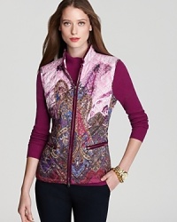 With a rich palette and intricate paisley print, this BASLER vest evokes a gorgeous elegance. Slip it on and take your everyday look to new heights of chic.