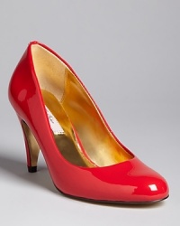 Set on moderate heels in slick patent leather, these Ted Baker pumps are going places, 9-to-5 and well beyond.