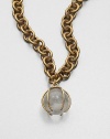 An exquisite bead of clear quartz held in an unique pronged setting on a chunky 14k goldplated link chain. Clear quartz14k goldplated brassLength, about 20Pendant size, about 1S-hook closureMade in USA