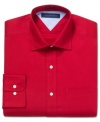 Put some pop in your daily desk look with this solid dress shirt from Tommy Hilfiger.