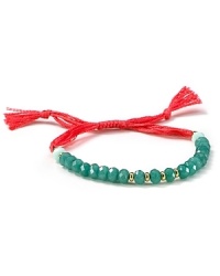 The classic friendship bracelet has officially gone glam. Shashi adds boldly hued cord and a row of semi-precious beads for a look that's totally bright now.