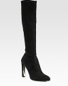 Stretch suede in a knee-high silhouette with a partially lacquered heel and rubber sole for traction. Self-covered and lacquered heel, 4 (100mm)Covered platform, ½ (15mm)Compares to a 3½ heel (90mm)Shaft, 18Leg circumference, 13Stretch suede upperLeather liningRubber solePadded insoleImportedOUR FIT MODEL RECOMMENDS ordering one half size up as this style runs small. 