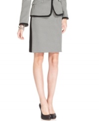 How does Tahari by ASL make classic houndstooth-checked fabric look new? Combine it with a streamlined pencil skirt silhouette and frame it with contrasting solid trim.