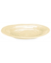 Celebrated chef and writer Sophie Conran introduces dinnerware designed for every step of the meal, from oven to table. A ribbed texture gives this tan platter from Portmeirion the charm of traditional hand-thrown pottery.