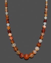 Spruce up your look with a splash of citrus! This vivid necklace features graduated, orange onyx beads (6-16 mm) and a 14k gold clasp. Approximate length: 18 inches.